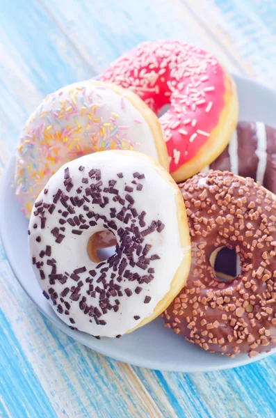 Donuts in einem Teller — Stockfoto