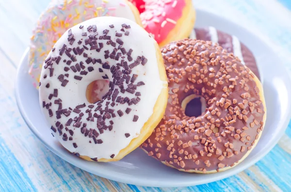 Donuts in een plaat — Stockfoto