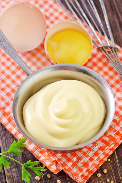 Mayonnaise in metal spoon
