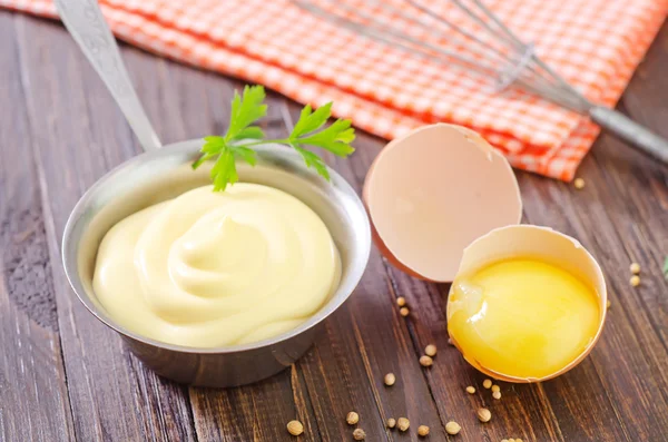 Mayonnaise in metal spoon — Stock Photo, Image