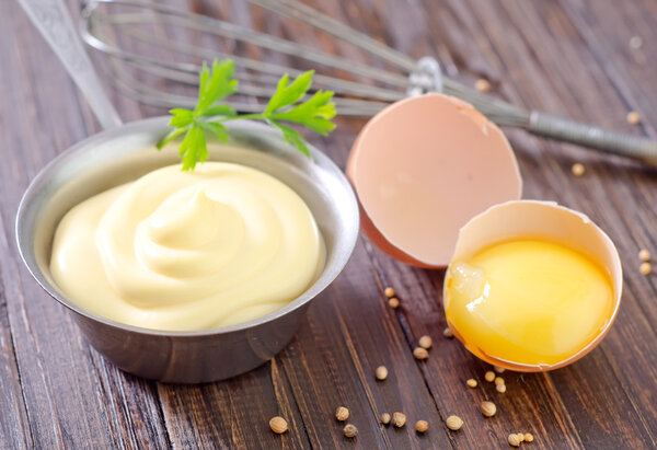 Mayonnaise in metal spoon
