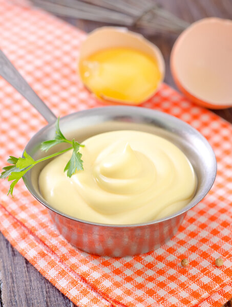 Mayonnaise in metal spoon