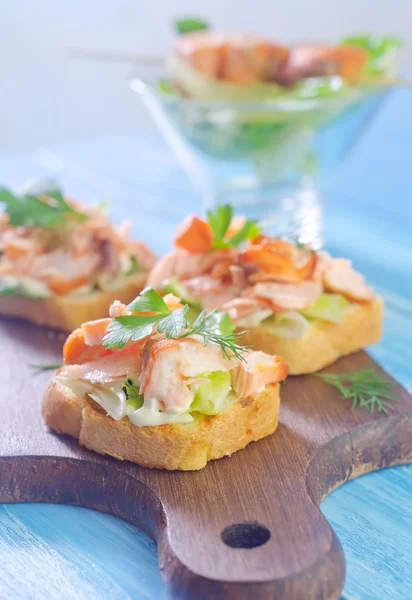 Sandwiches on a board — Stock Photo, Image