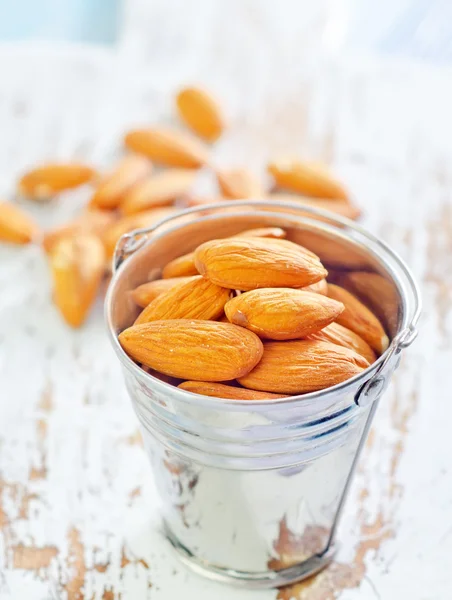 Almond in a bucket — Stock Photo, Image