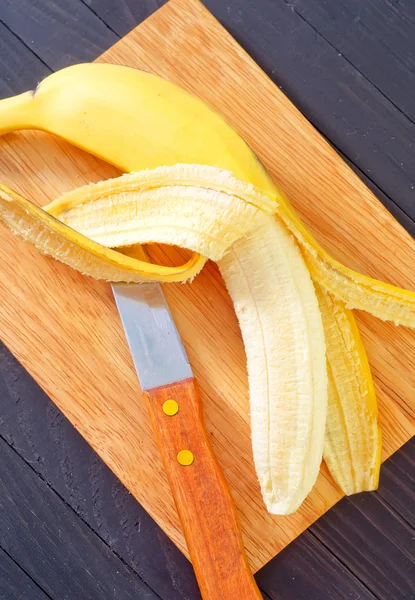 Banán na desce — Stock fotografie