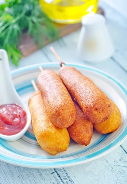 Corndogs on a plate — Stock Photo, Image