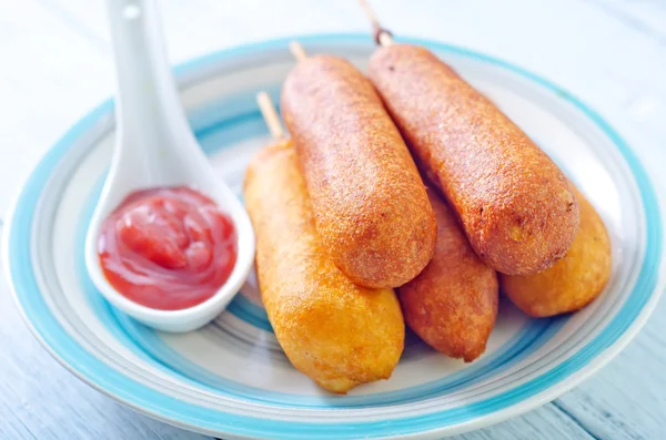 Corndogs on a plate — Stock Photo, Image