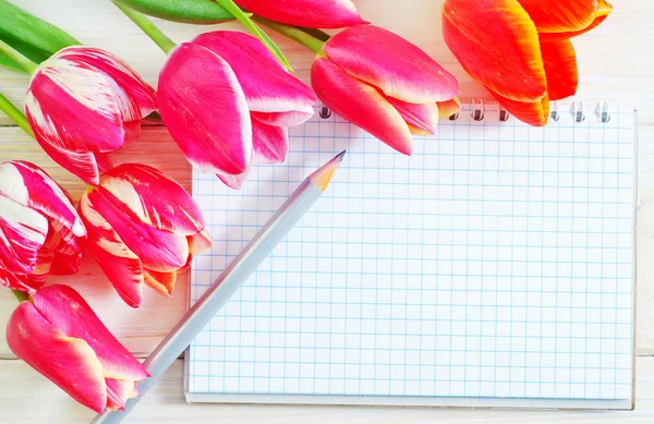 Tulips and note — Stock Photo, Image