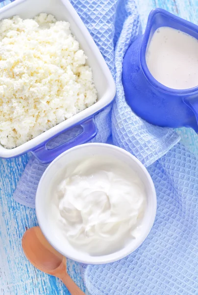 Milk products in a blue bowl — Stock Photo, Image