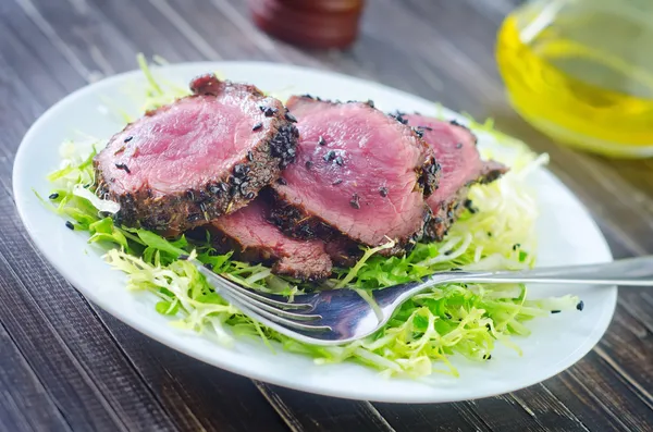Beef steak with fresh salad