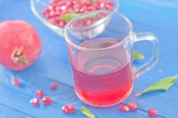 Pomegranate and juice — Stock Photo, Image