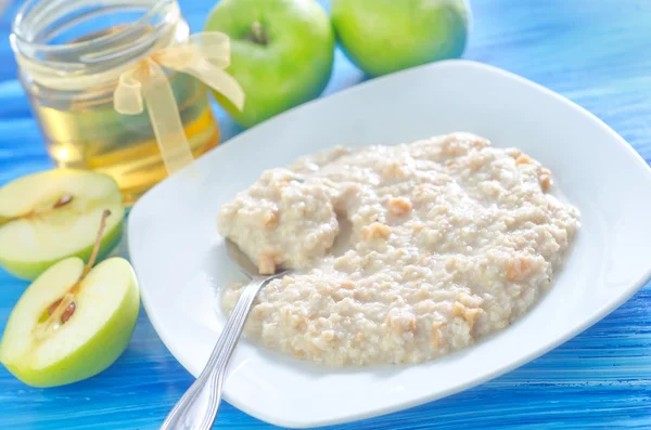 Oat flakes with apples — Stock Photo, Image