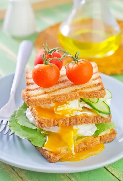 Toasts with egg-poached — Stock Photo, Image