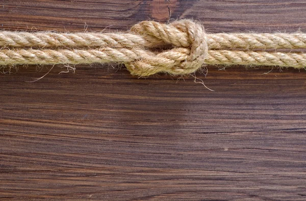 Rope on wooden backgrounds — Stock Photo, Image