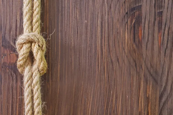 Rope on wooden backgrounds — Stock Photo, Image