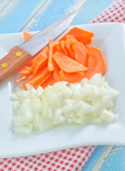 Raw carrot and onion Stock Image