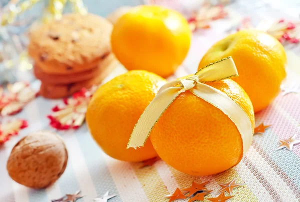 Mandariner på en festlig bakgrund — Stockfoto