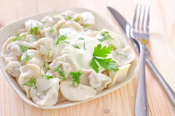 Pelmeni in a bowl — Stock Photo, Image