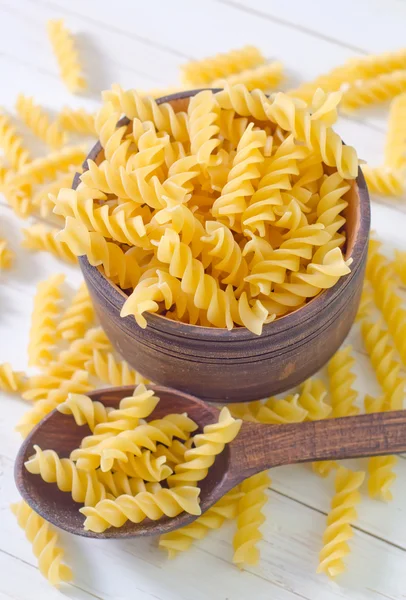 Pasta in a wooden bowl — Stock Photo, Image