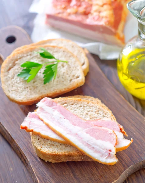 Bread with bacon — Stock Photo, Image