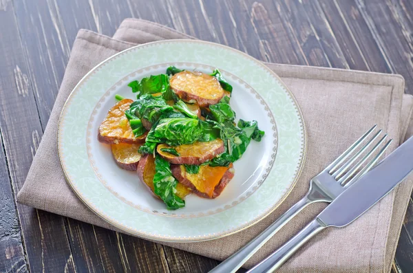 Sweet potato with spinach — Stock Photo, Image