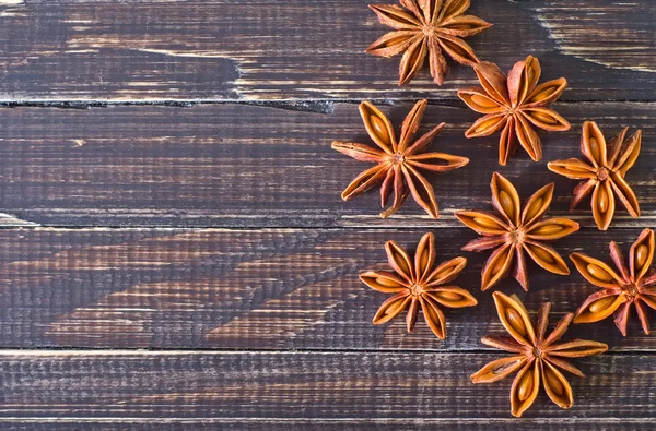 Anise on wooden board — Stock Photo, Image