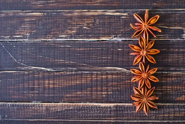 Anise on wooden board — Stock Photo, Image