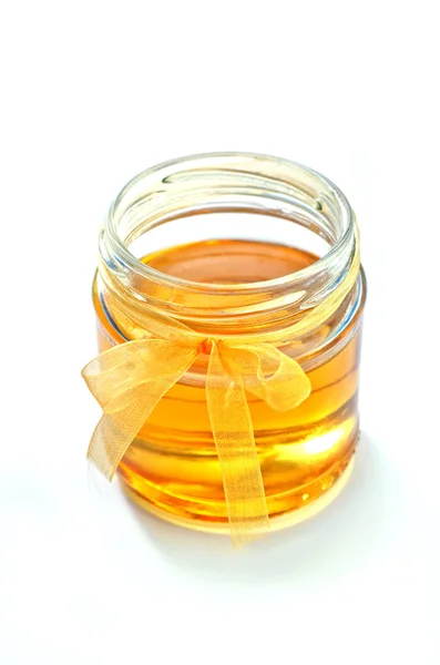 Honey in a glass jar — Stock Photo, Image