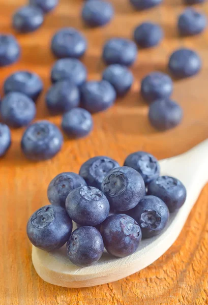 Blueberry in a wooden spoon — Stock Photo, Image