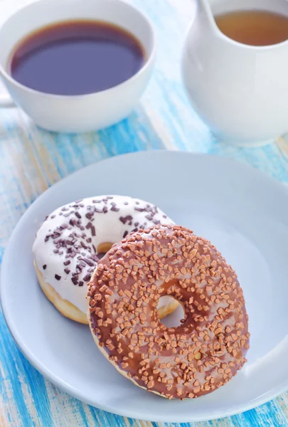 Donuts with cup of tea — Stock Photo, Image