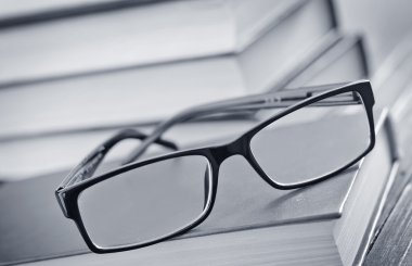 Glasses and books clipart