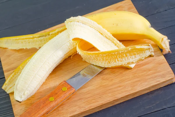 Banán na desce — Stock fotografie