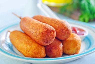 Corndogs on the plate clipart