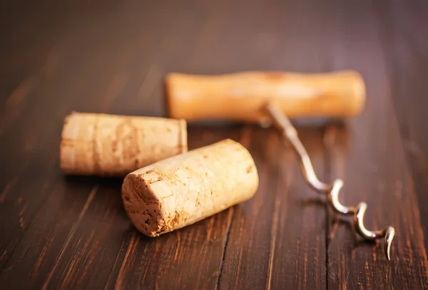Corks and a corkscrew — Stock Photo, Image
