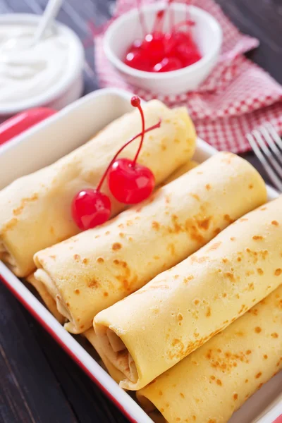 Pancakes with cherry — Stock Photo, Image