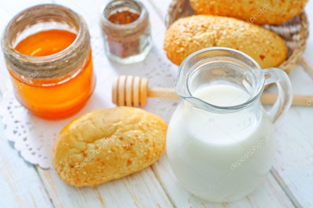 Milk, honey and bread — Stock Photo © tycoon 41791639