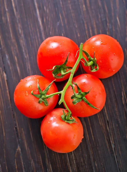 Tomato on table — Stock Photo, Image