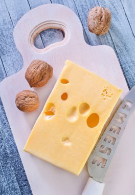 Cheese on a board clipart