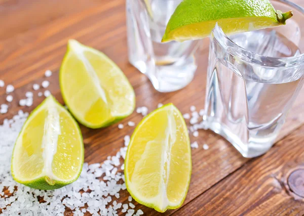 Limes and salt for tequila — Stock Photo, Image