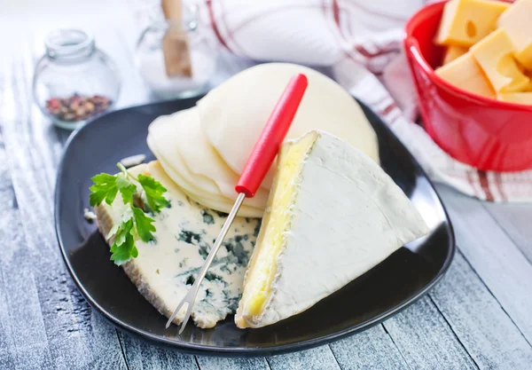 Cheese in a plate — Stock Photo, Image