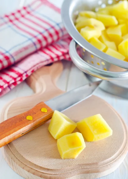 Potato on board — Stock Photo, Image