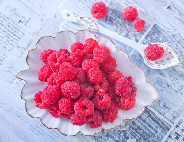 Raspberry in plate — Stock Photo, Image