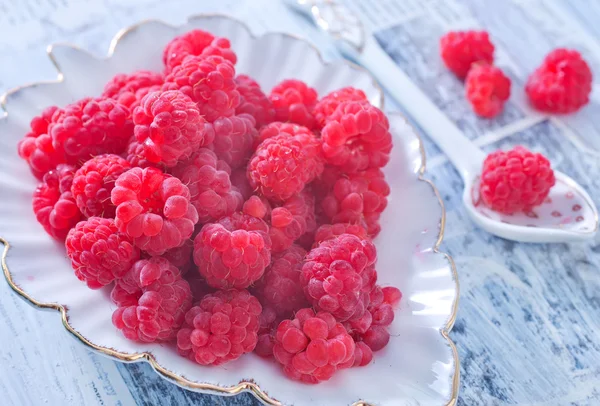 Raspberry in plate — Stock Photo, Image