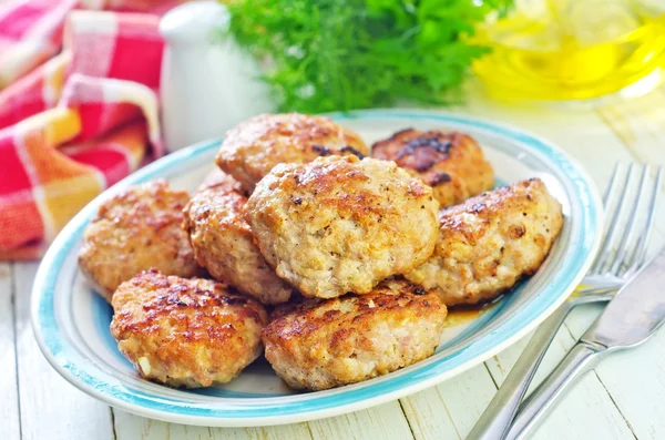 Chuletas en placa —  Fotos de Stock