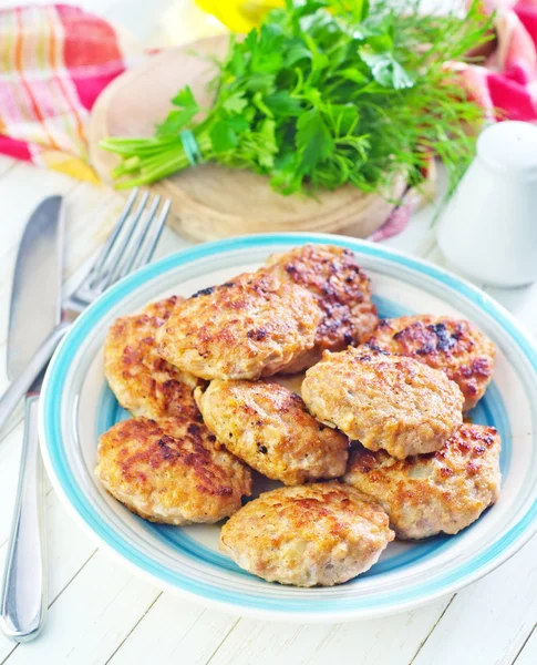 Chuletas en placa — Foto de Stock