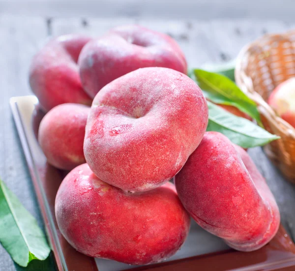 Peaches on table — Stock Photo, Image