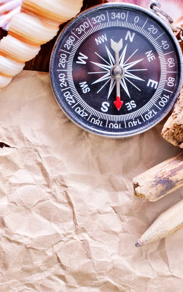 Background with shells and compass — Stock Photo, Image
