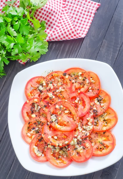 Tomato with basil and garlic — Stock Photo, Image