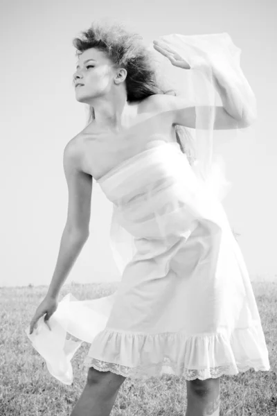 Woman with a white scarf — Stock Photo, Image