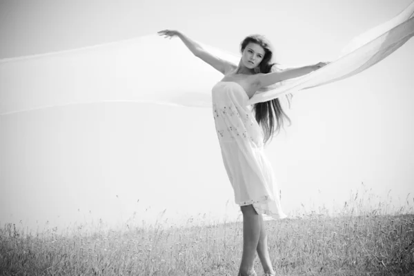 Woman with a white scarf — Stock Photo, Image